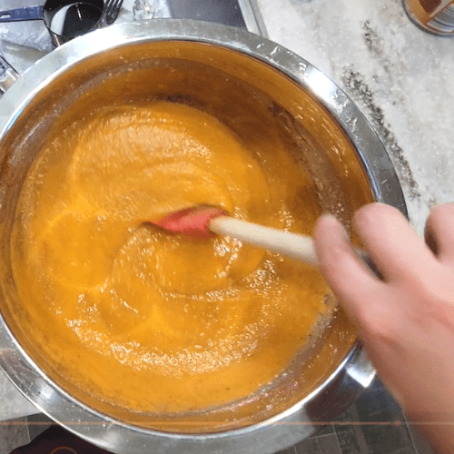 Mixing up Pumpkin Pie Filling in a bowl