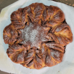 loaf of cinnamon Christmas Bread shaped like a snowflake or 8 sided star
