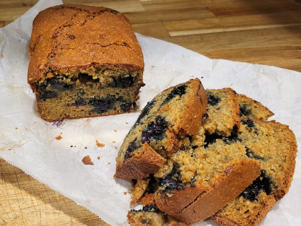 sliced blueberry bread that was made with freshly milled flour