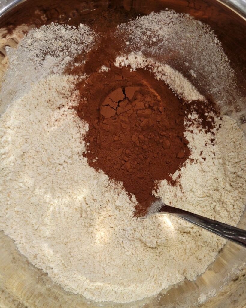 fresh milled flour, cocoa powder, and salt in a bowl