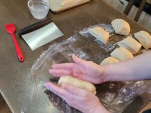 hands shaping the dough