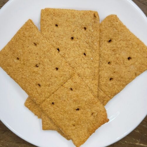 three Fresh Milled Flour Graham Crackers on a white plate