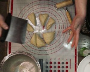 cutting the dough into 8 pieces