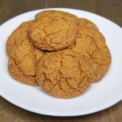 a plate of homemade thin & crispy Gingersnap cookies made with fresh milled flour