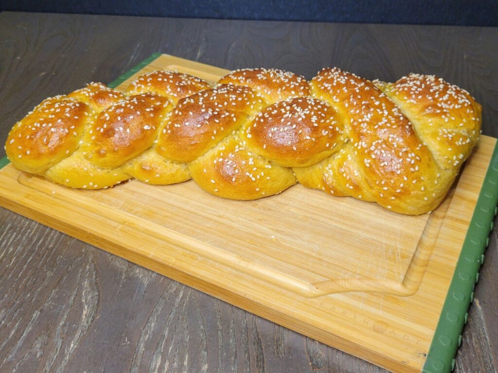 Challah made with fresh milled flour braided bread loaf with sesame seeds