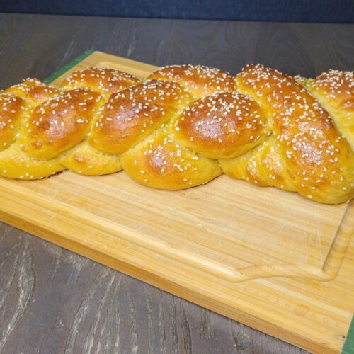 Challah made with fresh milled flour braided bread loaf with sesame seeds