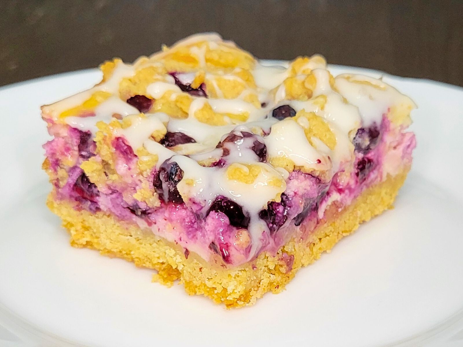 lemon blueberry cheesecake pie bar made with fresh milled flour