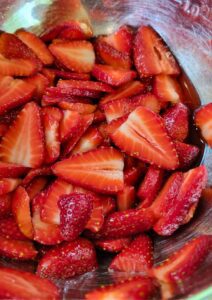 sliced fresh strawberries in sugar
