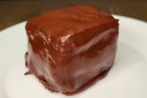 Chocolate Sourdough Snack Cake made with fresh milled flour after dipped in chocolate ganache