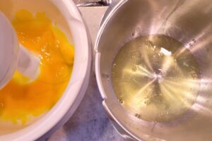 Separating the eggs into two different mixing bowls