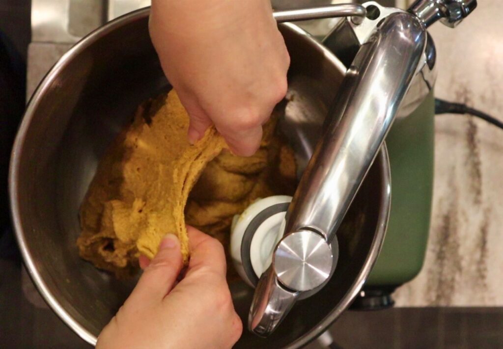 pumpkin cinnamon roll stretchy dough in the Ankarsrum mixer