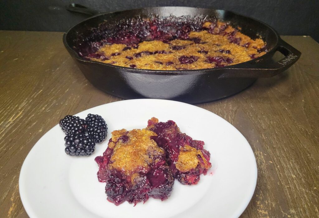 fresh milled flour blackberry cobbler in a cast iron skillet
