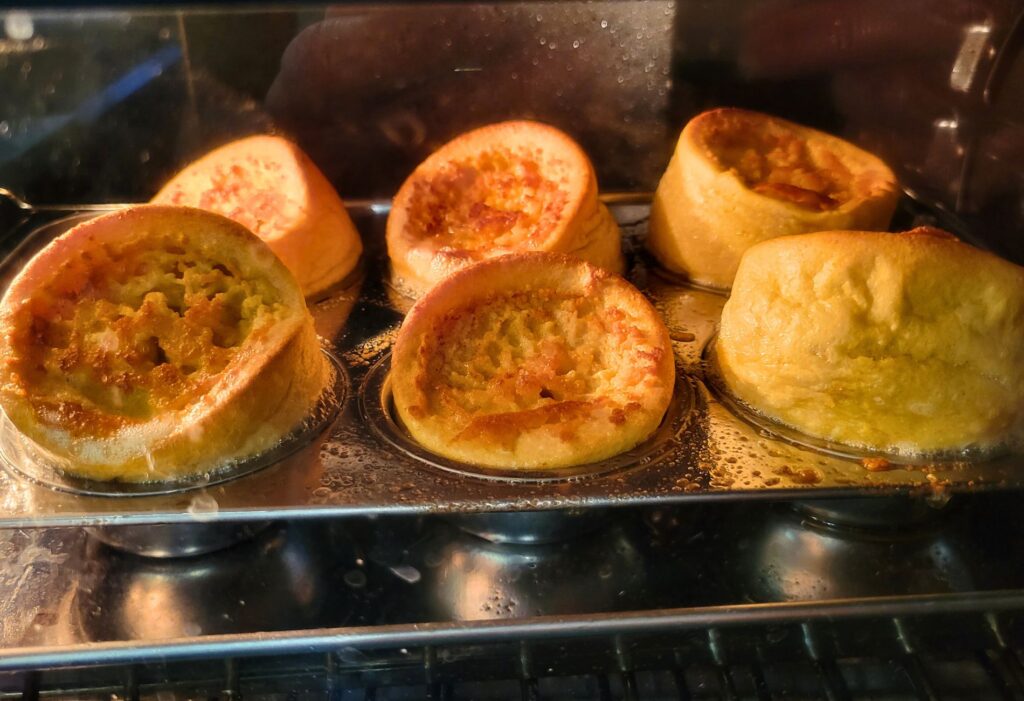 fresh milled flour popovers in the oven rising