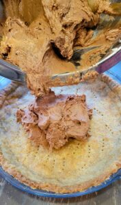 chocolate cream French silk pie made with fresh milled flour, getting layered