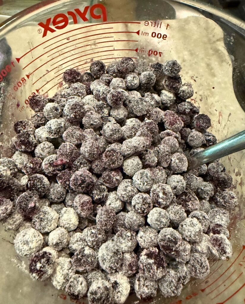 Coat the blueberries