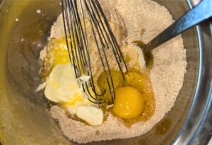 mixing the fresh milled flour cornbread batter